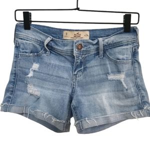 HOLLISTER MIDI SHORTS. LIGHT WASH DESTROY. SIZE: 0